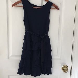 A navy blue dress with a sparkly belt!
